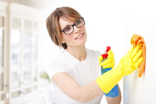 Cleaner in Balham completing end of tenancy cleaning in a property