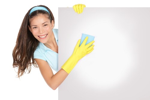 Local carpets cleaner in Balham treating stains on a hallway carpet