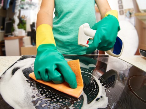 Balham office cleaners disinfecting high-touch areas in a modern workspace